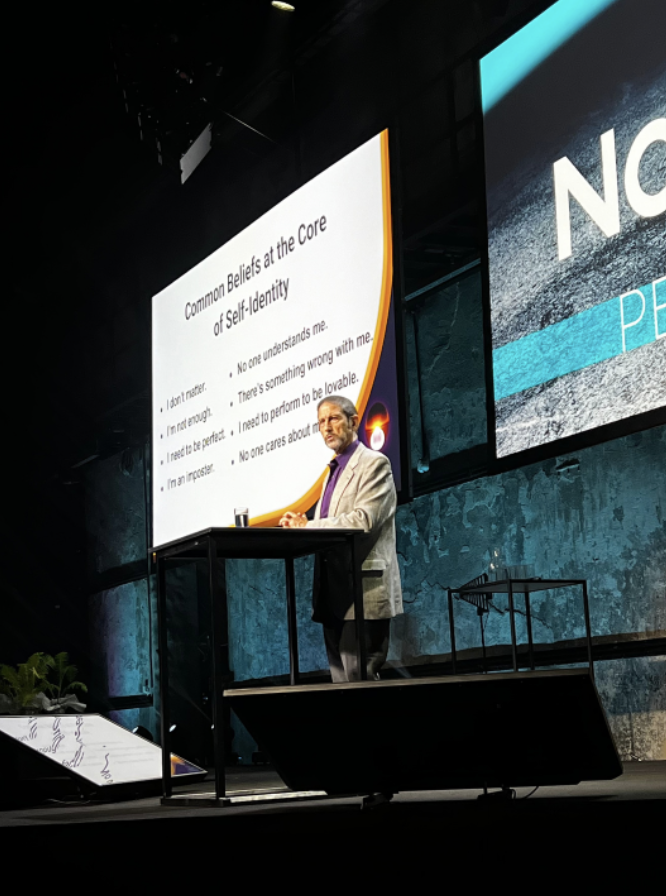 Lion Goodman speaking at conference
